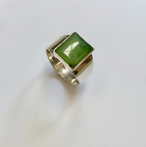 pounamu signet ring (dark inclusions)